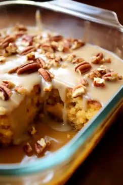 Butter Pecan Praline Poke Cake - That Oven Feelin